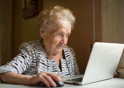 Older woman on a laptop